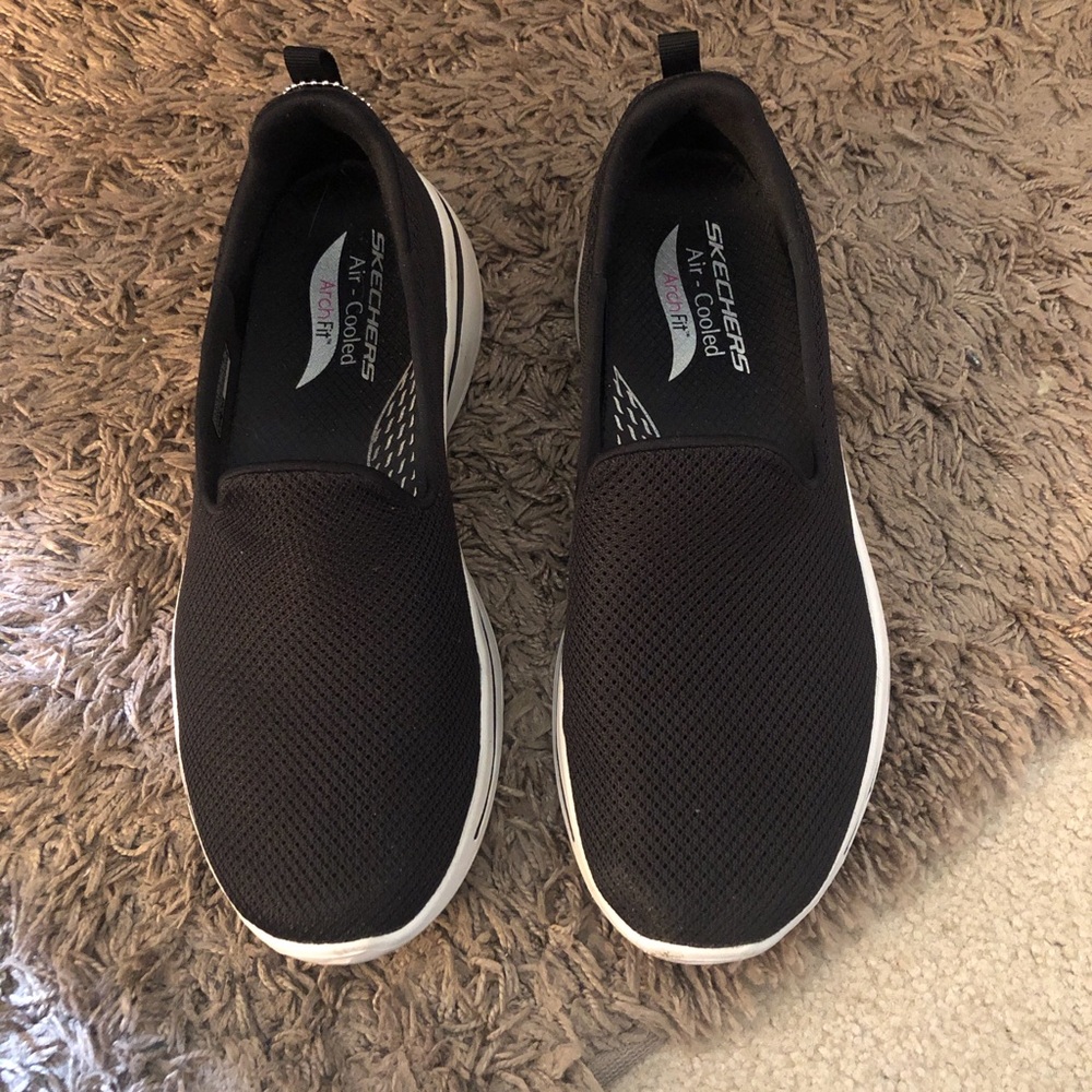 Skechers Black Slip-On Athletic Sneakers with White Soles